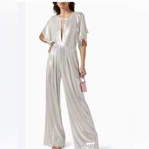 Norma Kamali Metallic Silver jumpsuit. Has large wide legs. Size XS NWOT